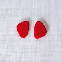 Load image into Gallery viewer, Cherry Red organic shaped stud earrings handmade from polymer clay by Vertseas.
