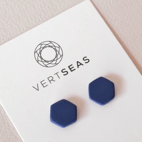 Navy blue hexagon stud earrings handmade from polymer clay by Vertseas.