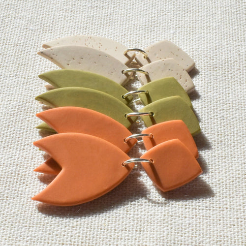 Ray statement earrings organic hand cut and handmade from polymer clay in terracotta, green and sand colours.