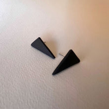 Load image into Gallery viewer, Matte black triangle stud earrings handmade from polymer clay by Vertseas.
